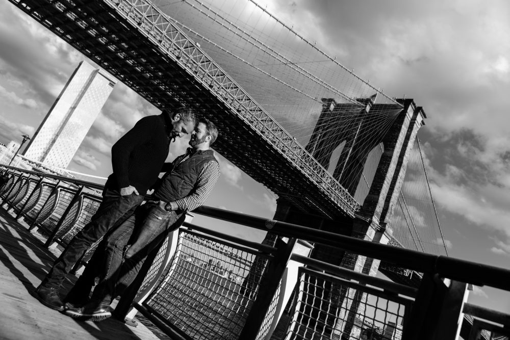 engagement session looking over Brooklyn bridge