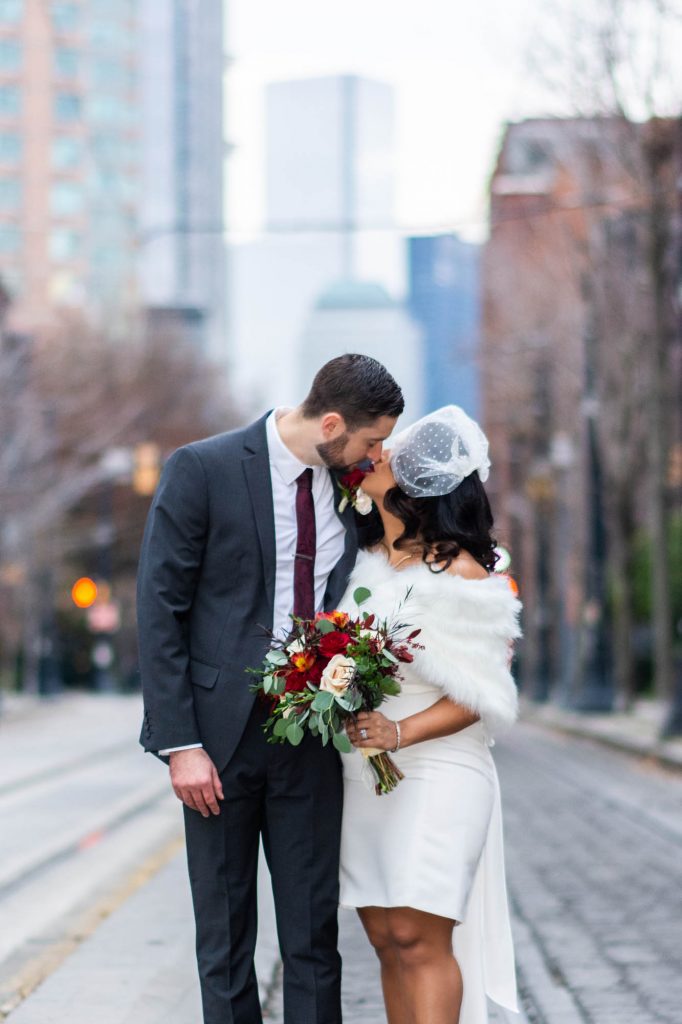 bride and groom kissing