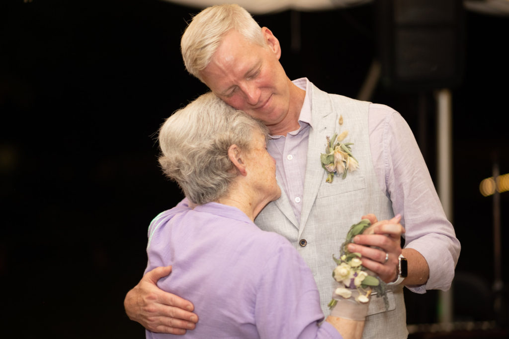 groom dancing with mom